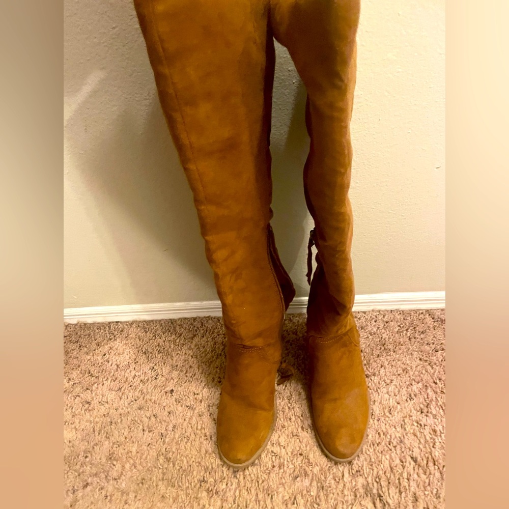 Tall heeled brown boots
